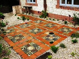 Patio of paments, floor bricks and cobbles reclaimed paving patio