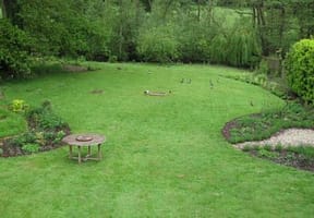 View across lawn large curvy lawn