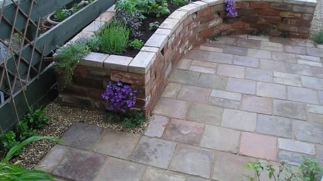 Paving raised herb bed